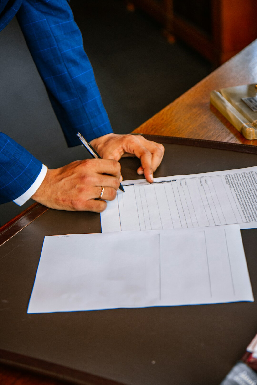 person signing insurance document